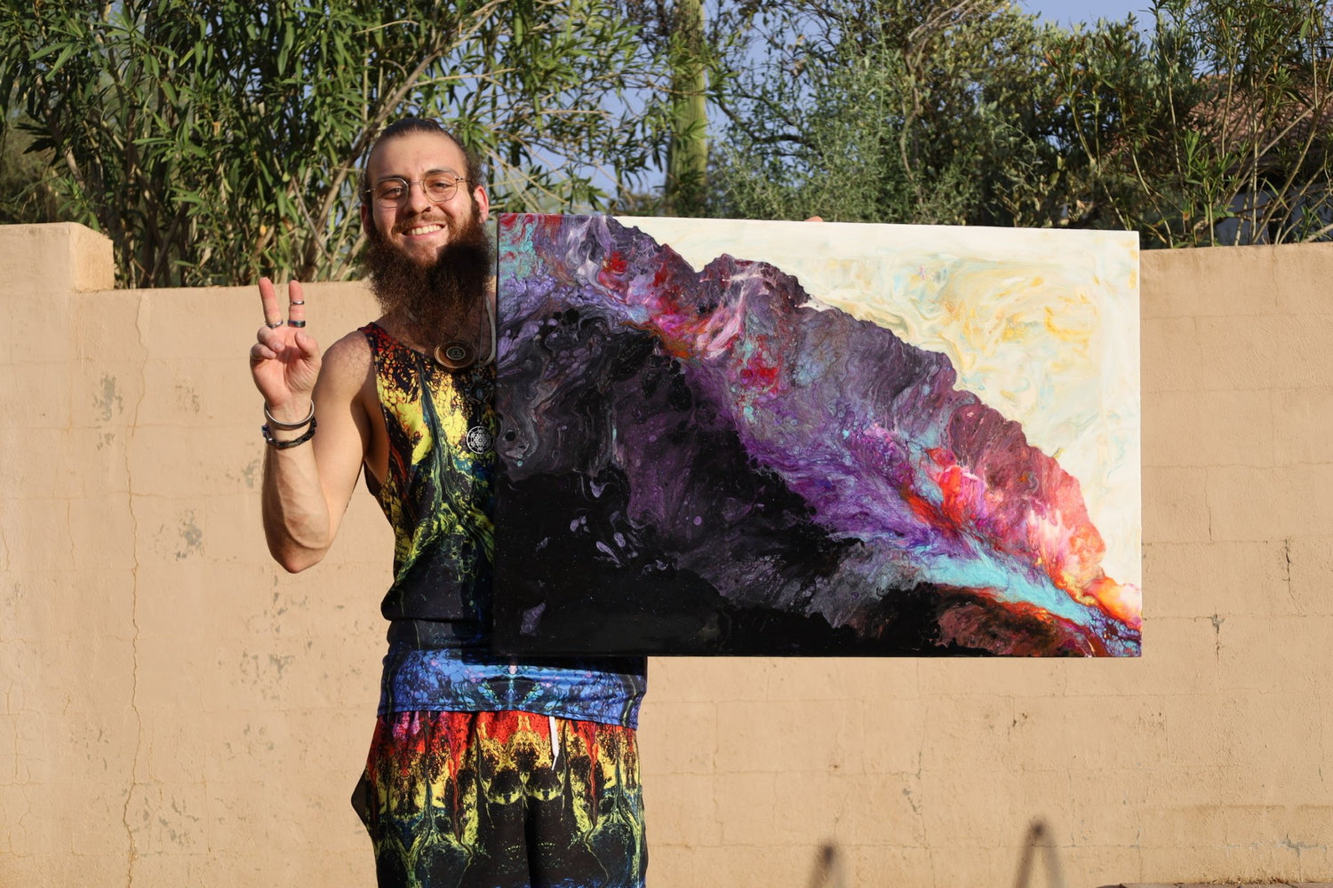 The Pour Hippy, a fluid artist holding a centerpiece commission